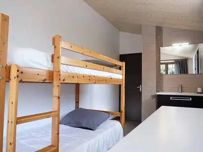 Un ou plusieurs lits dans un hébergement de l'établissement Maison familiale 10 pers, annexe, plage 250m, wifi, parking, jardin clos, terrasse avec pergola - FR-1-224B-163