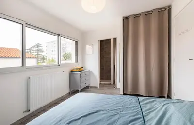 Un ou plusieurs lits dans un hébergement de l'établissement La villa Hérault