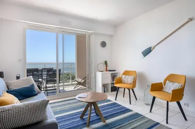 Coin salon dans l'établissement Vue mer - Appartement face mer pour 6