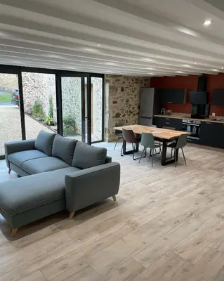 Coin salon dans l'établissement Gîte de la Foye - Le Jasmin