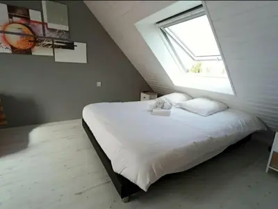 Un ou plusieurs lits dans un hébergement de l'établissement Superbe loft 90m² proche parc expo Nantes (6p)
