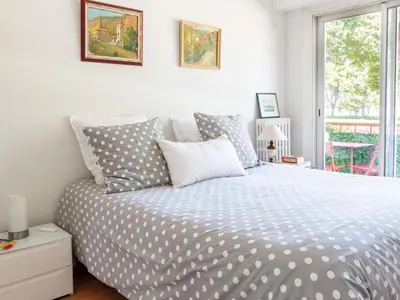 Un ou plusieurs lits dans un hébergement de l'établissement Apartment Les Pêcheries by Interhome
