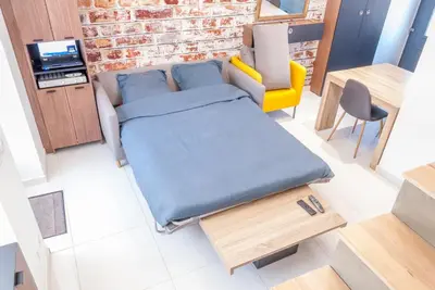Un ou plusieurs lits dans un hébergement de l'établissement Maison avec terrasse plein sud à 7 min de la gare