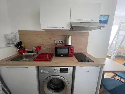 Cuisine ou kitchenette dans l'établissement ATLANTIS