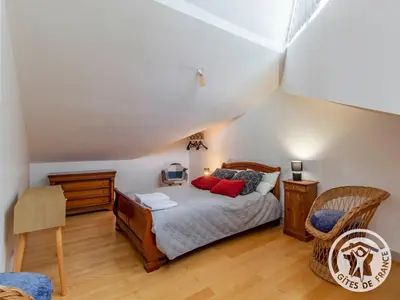 Un ou plusieurs lits dans un hébergement de l'établissement Gîte charmant avec jardin au cœur du vignoble du Layon, proche Saumur, 9 couchages, vélos inclus - FR-1-622-19