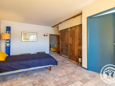 Un ou plusieurs lits dans un hébergement de l'établissement Maison Authentique sur 3 Niveaux avec Terrasse et Vue Loire - FR-1-622-38