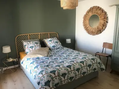 Un ou plusieurs lits dans un hébergement de l'établissement Maison de Vacances 2 personnes, ossature bois, à Saint Gilles Croix De Vie 85