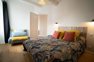 Un ou plusieurs lits dans un hébergement de l'établissement Appartement cosy en cœur de bourg
