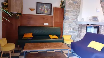 Coin salon dans l'établissement Maison de charme à Mouzillon - Jardin et terrasse accueillante