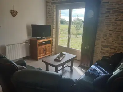 Télévision ou salle de divertissement dans l'établissement gîte « Chez Albertine et Thérèse »