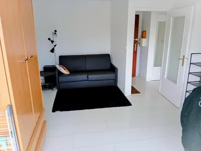 Coin salon dans l'établissement T1 parc paysager St Nazaire