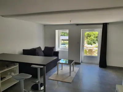 Coin salon dans l'établissement La Maison du Main Coon