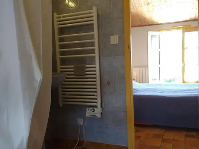 Un ou plusieurs lits dans un hébergement de l'établissement Maison confortable avec jardin, proche plages et centre, 6 couchages, Noirmoutier-en-l'Île - FR-1-224B-172