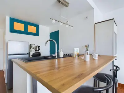 Cuisine ou kitchenette dans l'établissement À 200m de la plage, appartement pour 4