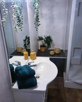 Salle de bains dans l'établissement Bel appartement à 3 min de la plage de 60m²