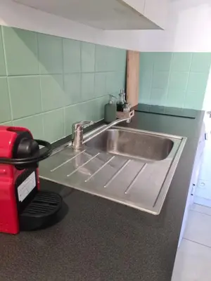 Cuisine ou kitchenette dans l'établissement Bel appartement à 3 min de la plage de 60m²
