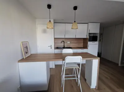 Cuisine ou kitchenette dans l'établissement Appartement proche plages