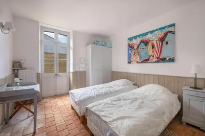Un ou plusieurs lits dans un hébergement de l'établissement Villa familiale pour 11 personnes à 300m de la mer