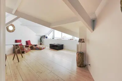Coin salon dans l'établissement La Galerie Pornic - Maison Cedre