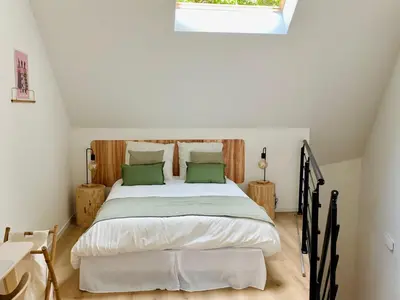 Un ou plusieurs lits dans un hébergement de l'établissement Duplex avec parking proche Stade de la Beaujoire, parc des expositions, bord de l'Erdre