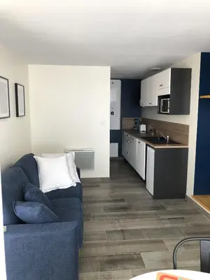Cuisine ou kitchenette dans l'établissement Studio Place 28 à Joue sur Erdre