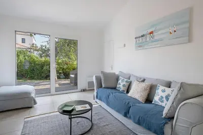 Coin salon dans l'établissement Maison pour 8 personnes à 300 m de la plage