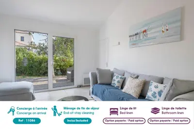 Coin salon dans l'établissement Maison pour 8 personnes à 300 m de la plage