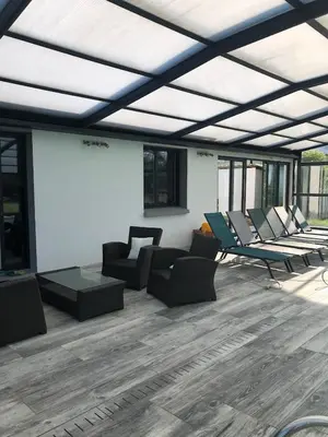 Coin salon dans l'établissement MAISON FAMILLE