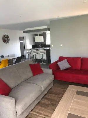 Coin salon dans l'établissement MAISON FAMILLE