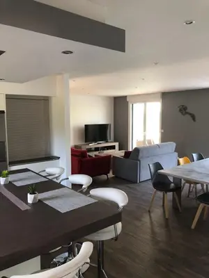 Coin salon dans l'établissement MAISON FAMILLE
