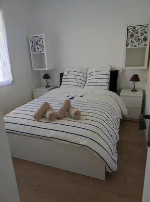 Un ou plusieurs lits dans un hébergement de l'établissement Maison proche du centre ville