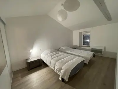 Un ou plusieurs lits dans un hébergement de l'établissement Chez Camille