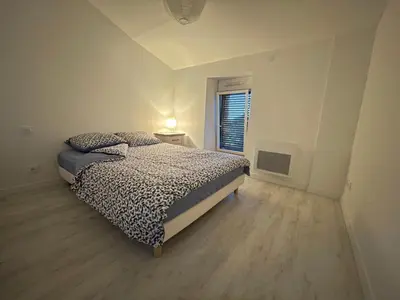 Un ou plusieurs lits dans un hébergement de l'établissement Chez Camille
