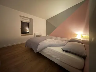 Un ou plusieurs lits dans un hébergement de l'établissement Chez Camille