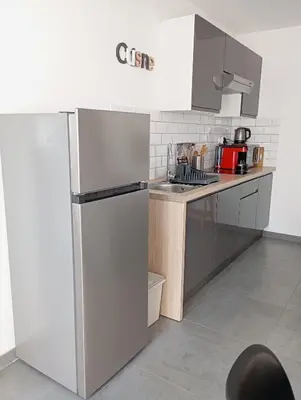 Cuisine ou kitchenette dans l'établissement La Petite Florentine