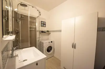 Salle de bains dans l'établissement Vacances a deux pas de la plage pour quatre personnes
