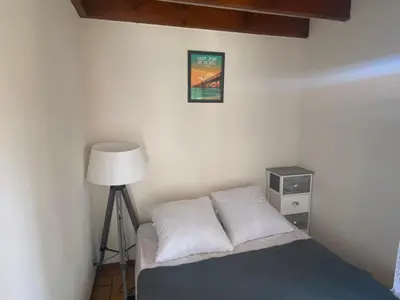 Un ou plusieurs lits dans un hébergement de l'établissement Maisonnette hameau des pins