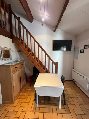 Cuisine ou kitchenette dans l'établissement Maisonnette hameau des pins