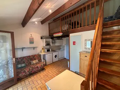 Cuisine ou kitchenette dans l'établissement Maisonnette hameau des pins