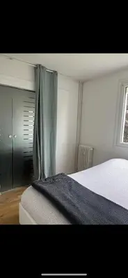 Un ou plusieurs lits dans un hébergement de l'établissement Beau T3 60m2 très cosy proche du centre ville