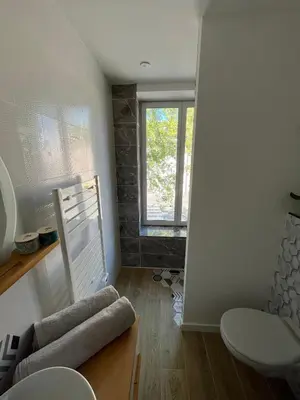 Coin salon dans l'établissement Appartement de charme - Cholet Centre