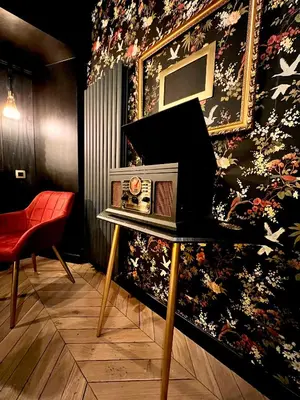 Télévision ou salle de divertissement dans l'établissement Love Room Secrète Les Petits Plaisirs