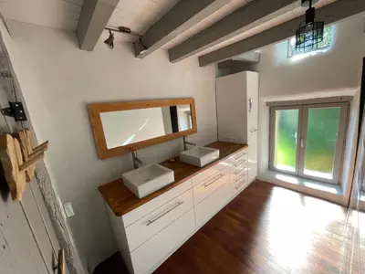Un ou plusieurs lits dans un hébergement de l'établissement Gîte avec piscine intérieur, Le Repère de Choiseau