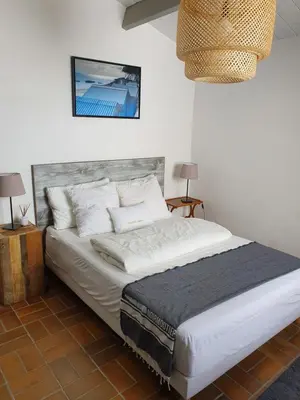 Un ou plusieurs lits dans un hébergement de l'établissement La Villa du Tesselier