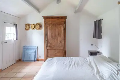 Un ou plusieurs lits dans un hébergement de l'établissement Les Joublanchas : Maison familiale mer et campagne pour 16