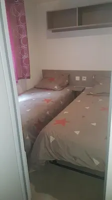 Un ou plusieurs lits dans un hébergement de l'établissement Agréable Mobilhome 6 - 8 places