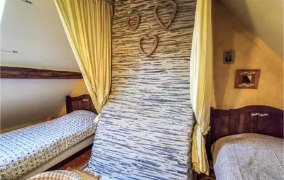 Un ou plusieurs lits dans un hébergement de l'établissement Pet Friendly Home In Marsac Sur Don