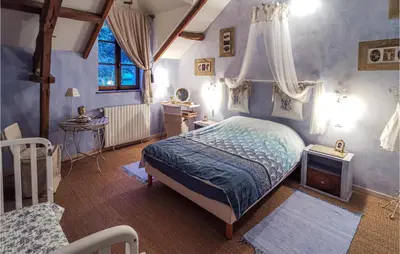 Un ou plusieurs lits dans un hébergement de l'établissement Pet Friendly Home In Marsac Sur Don
