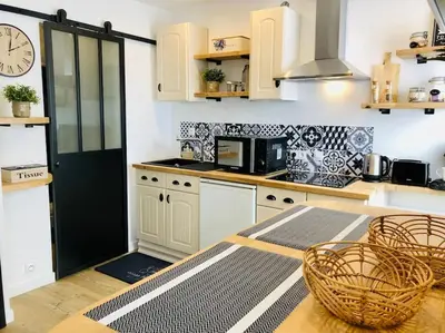 Cuisine ou kitchenette dans l'établissement Joli studio cosy
