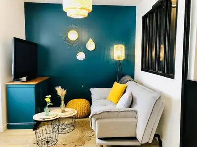 Coin salon dans l'établissement Joli studio cosy